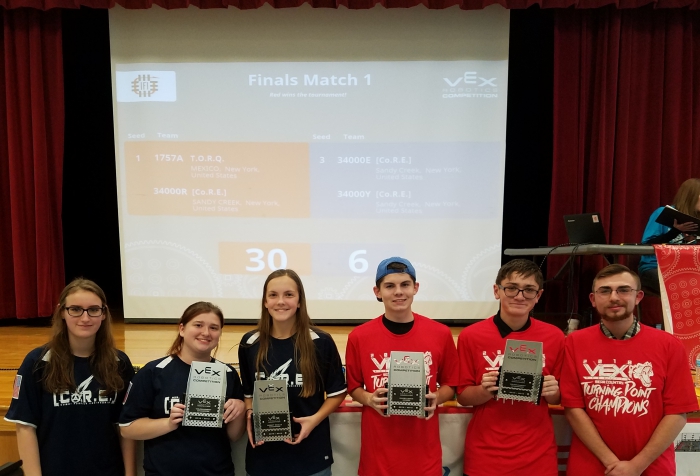 Members of the [Co.R.E.] and T.O.R.Q. teams following their successful win at a recent robotics tournament held in Chittenango. Pictured left to right are: Margery Yousey, Sadie Lurcock, Hailey McNitt, Evan Blunt, Brian Thorp, and Stephen Ruffalo.