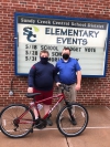 Zach Baker, the contest's grand prize inner and SC Elementary Principal Mr. Filiatrault.