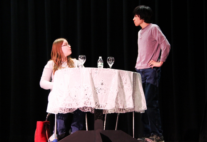 Pictured are students Nicholas Radford and Anita Glenister practicing a scene in which an alien goes on a first date with a human.