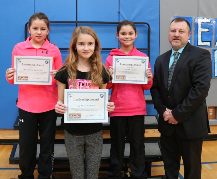 Recipients of the ‘Leadership Award,’ presented by Sandy Creek Elementary School Principal Tim Filiatrault are recognized for their outstanding leadership abilities and for representing the seven habits. The students are nominated by their fellow students and selected by a committee to receive the award. A tie resulted in three awards being presented to: Madison Darling, Sophie Harris and Olivia Euler. Pictured with the students is Tim Filiatrault, principal at Sandy Creek Elementary School.