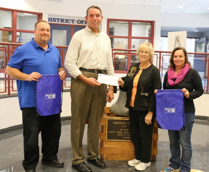 Sandy Creek's Back Pack Program receives a generous donation from the United Way.