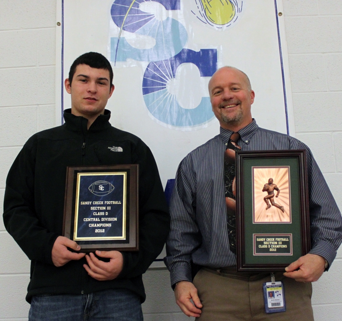 Central New York Football Coach of the Year for Section III Michael Stevens, right, and Mason McNitt, selected Defense All Star Team for Section III each give credit to the Sandy Creek Central School District coaching staff, players, school, and community for their successful season.