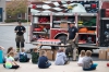 Lacona Fire Department Chief Mike LaRock and Second Lieutenant Gage MacDuffie teaching Sandy Creek students about fire safety and prevention.