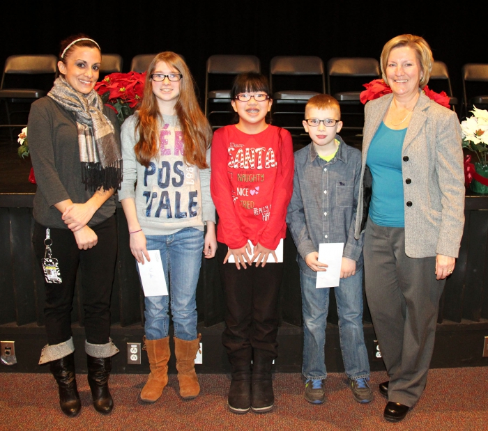 Pictured, left to right are: Eighth Grade English Teacher Jodi Whitney, Sadie Lurcock, Emma Halsey, Matt Trudell, and Sandy Creek Middle School Principal Carolyn Shirley.