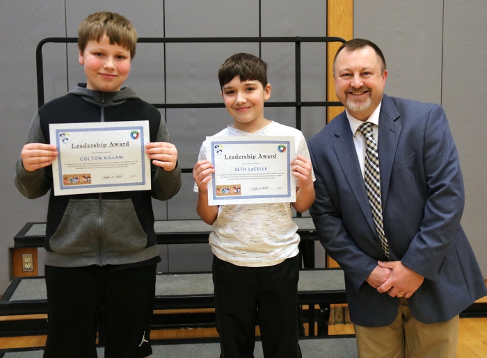 Two of the three recipients of the Leadership Award for outstanding fifth graders who show leadership every day in their school, are pictured with Sandy Creek Elementary Principal Timothy Filiatrault, at right. At left is Colton Killam and Seth La Celle, center received the award presented by last quarter’s recipients. A third recipient or the leadership award was Jesiah Curry, who was unable to attend the ceremony.