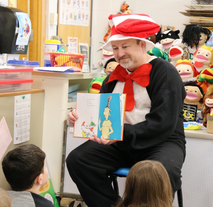 Sandy Creek Elementary School Principal Tim Filiatrault reads a story to pre-schoolers in the district.