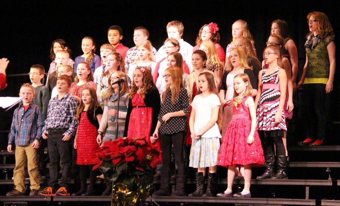 Fifth grade chorus delighted the audience with their song tributes to snow.