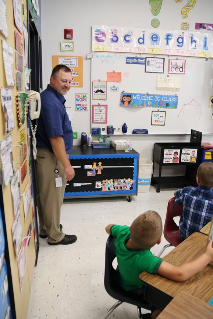 Sandy Creek Elementary School Principal Timothy Filiatrault visited classrooms on the first day of school welcoming students to the new school year.