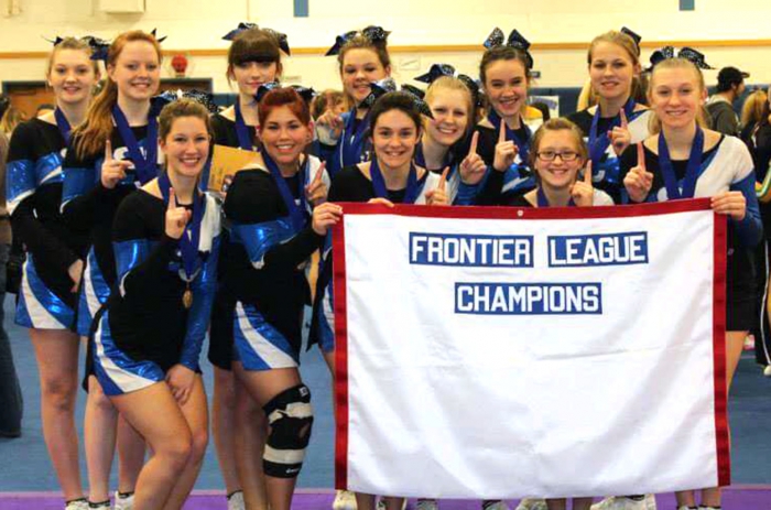 Pictured in front, left to right with the Champion's banner are: Kim Distasio, Alina Quintana, Sammi Pandolfi, Sara Castor, and Lindsey Goodnough. In back, left to right: Dallas Blair, Mikayla Russell, Lexi Goodnough, Angelina Salzman, Jessica Leppien, Tara Huggins and Bailey Laundre.