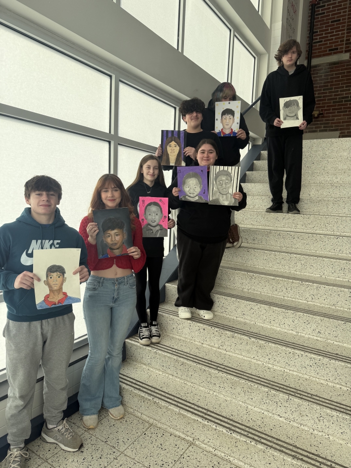 Students present their artwork.